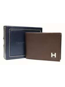     Tommy Hilfiger. -  1